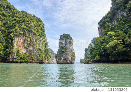 Scenic limestone landscape of phang nga bay in thailand with clear sky and calm 131033205