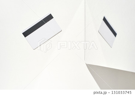 Minimalist composition with two blank white cards on light background 131033745