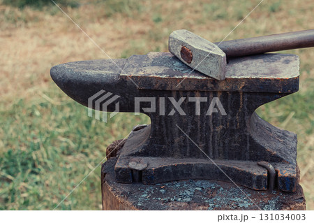 anvil and hammer heavy basic blacksmith tool, traditional way of making metal products 131034003