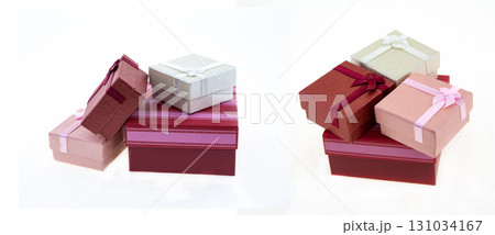 set of gifts, red and pink gift boxes stacked in a pile on an isolated background set of gifts, red and pink gift boxes stacked in a pile on an isolated background 131034167