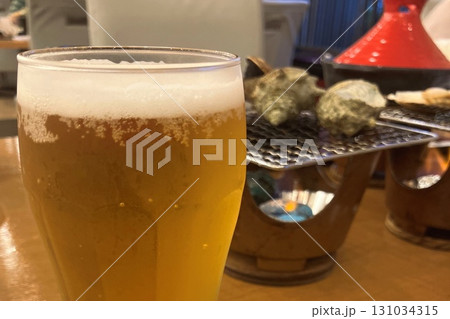 サザエの網焼を肴に冷たいビールで一杯 131034315