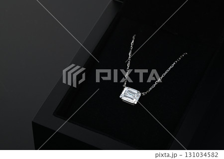 A diamond necklace is displayed in a black box A diamond necklace is displayed in a black box 131034582