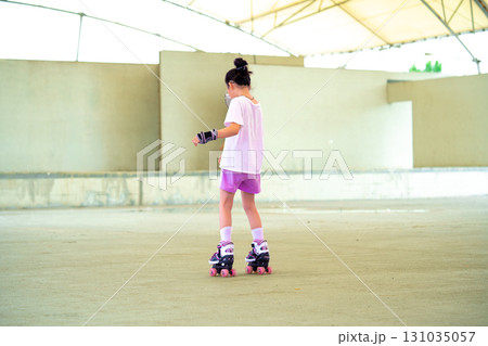 Asian teen girl roller skating. Roller-skating. Korea 131035057