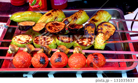 Grilled Vegetable Skewers with Tomatoes Zucchini Peppers and Eggplants 131035637