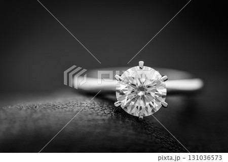 Platinum White Gold Diamond Ring on Dark background 131036573