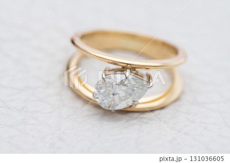 Pear Cut Diamond Ring on White Background Pear Cut Diamond Ring on White Background 131036605