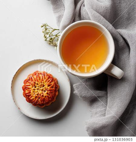 Mooncake with tea on white background, elegant and simple 131036903