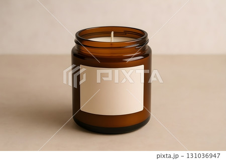 Amber glass jar candle with blank label on a neutral background, minimalist design for branding Amber glass jar candle with blank label on a neutral background, minimalist design for branding 131036947