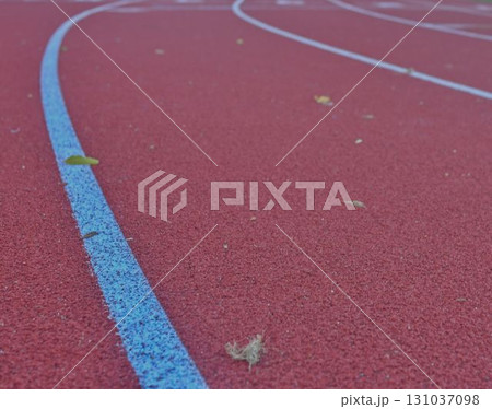 Athletics track at the stadium. Tartan track and running track. The concept of running as a journey through life. 131037098
