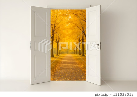 Open white doors reveal a glowing autumn avenue of trees 131038015
