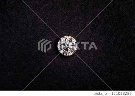 A diamond is on a black background A diamond is on a black background 131038289