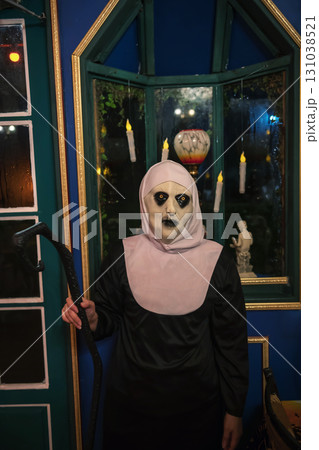 Fear devilish nun with witch Cane for 2025 Halloween party 131038521