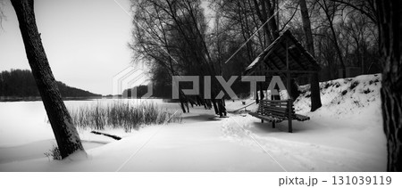 Winter Riverside Serenity: A Frosty Tale Along the Riverbanks 131039119