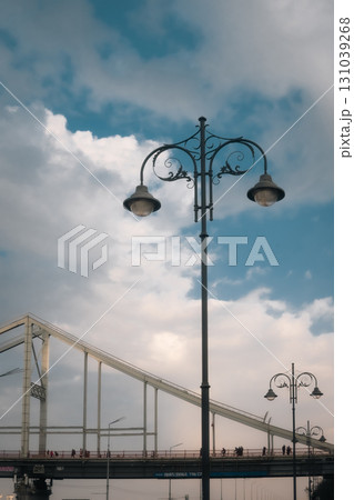 KYIV, UKRAINE Pedestrian bridge over Dnypro river in Kyiv KYIV, UKRAINE Pedestrian bridge over Dnypro river in Kyiv 131039268