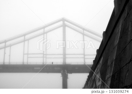 The thick fog lends an air of mystery to the scene. The thick fog lends an air of mystery to the scene. 131039274