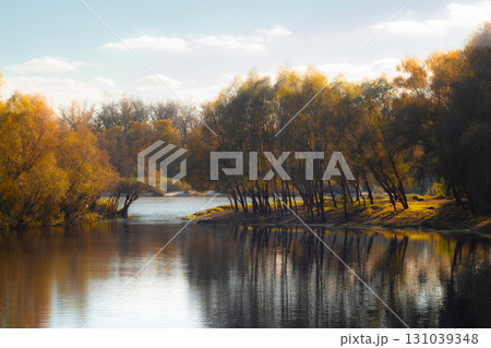 Autumn River Landscape with Colorful Trees and Reflections 131039348