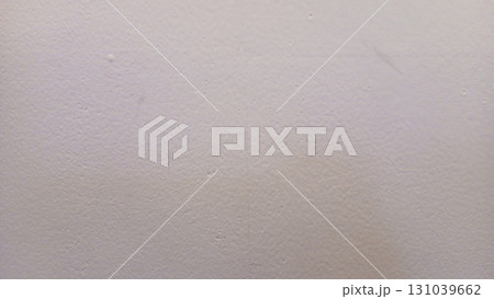 Textured white wall background with subtle imperfections Textured white wall background with subtle imperfections 131039662