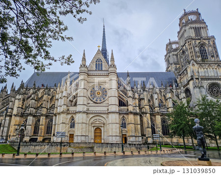 The magnificent Flamboyant Gothic Orleans Cathedral of the Holy Cross on a rainy day. French basilique Sainte-Croix ornate with twin towers and a large rose windows The magnificent Flamboyant Gothic Orleans Cathedral of the Holy Cross on a rainy day. French basilique Sainte-Croix ornate with twin towers and a large rose windows 131039850
