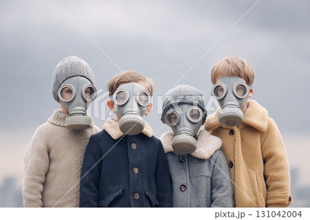 Children wearing vintage gas mask standing outdoors in cold weather, eerie mood and muted sky creating dramatic atmosphere 131042004