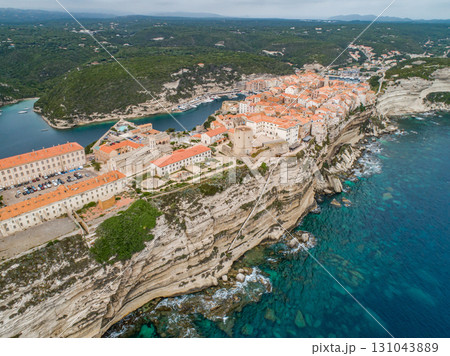Aerial view marina cape Bonifacio south Corsica France citadel on rocky promontory on wild white limestone cliffs Aerial view marina cape Bonifacio south Corsica France citadel on rocky promontory on wild white limestone cliffs 131043889