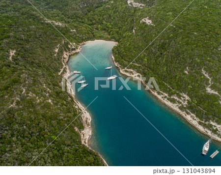 Aerial view marina cape Bonifacio south Corsica France citadel on rocky promontory on wild white limestone cliffs 131043894