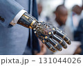 Futuristic robotic prosthetic arm showcased by a professional in a modern business environment 131044026