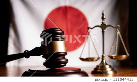 Justice gavel and scales with Japanese flag background 131044413