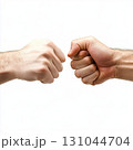 Male hands tensing, fists nearly colliding, symbolizing competitive challenge, negotiation tension, or impending conflict against stark white background 131044704