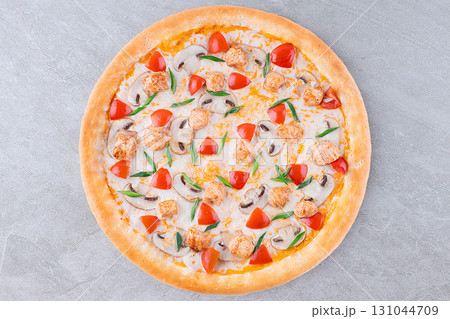 Chicken Pizza with Mushrooms Cherry Tomatoes and Green Onions on Cheese Base 131044709