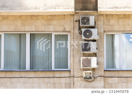 Air conditioners on the facade of the house, ventilation and cooling system. 131045078