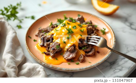 A vibrant plate displaying a cheesesteak burger, topped with cheese, capturing the essence of summer cuisine 131047907
