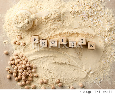 vegan protein powder with wooden letters 131056811
