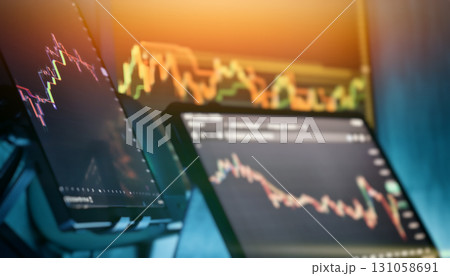 Multiple trading screens showing market analysis 131058691