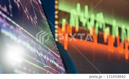 Colorful trading monitors with stock market graphs 131058692