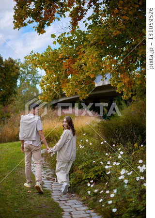 Young Cute Female Hugs Boyfriend. In Autumn Outdoor. Lovers Walking in Park. Attractive Funny Couple. Lovestory in Forest. Man and Woman. Cute Lovers in the Park. Family Concept. Happy Couple. Young Cute Female Hugs Boyfriend. In Autumn Outdoor. Lovers Walking in Park. Attractive Funny Couple. Lovestory in Forest. Man and Woman. Cute Lovers in the Park. Family Concept. Happy Couple. 131059526