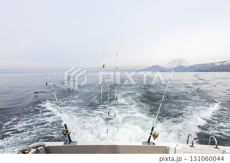 fishing rods on stern of boat during fishing 131060044