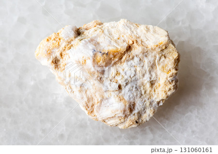 sample of rough xonotlite mineral on white marble sample of rough xonotlite mineral on white marble 131060161