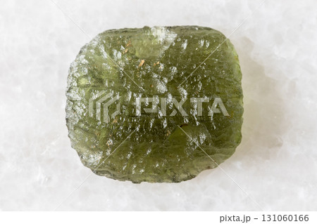 sample of raw moldavite tektite glass on white sample of raw moldavite tektite glass on white 131060166
