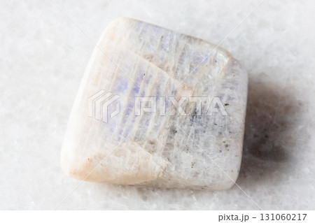 polished belomorite moonstone mineral on white 131060217