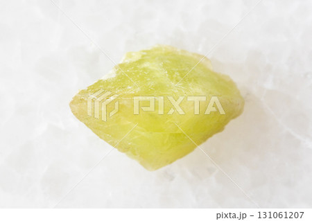 sample of rough sphene crystal on white marble 131061207