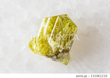 sample of rough chrysoberyl mineral on white 131061210