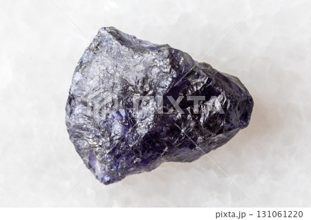 sample of uncut cordierite mineral on white 131061220