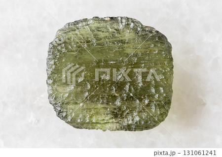 sample of rough moldavite tektite glass on white sample of rough moldavite tektite glass on white 131061241