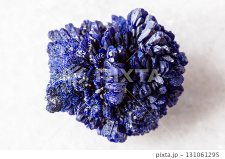 rough crystalline azurite mineral on white marble rough crystalline azurite mineral on white marble 131061295