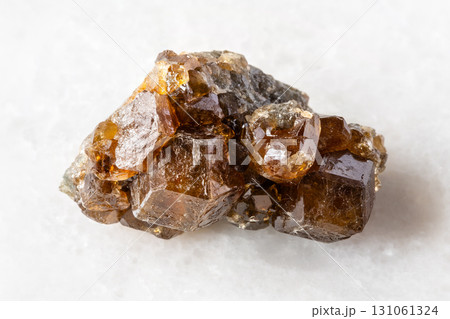raw hessonite grossular crystals on white 131061324