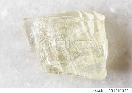 sample of raw spodumene mineral on white marble sample of raw spodumene mineral on white marble 131061330