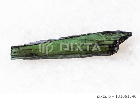 sample of rough vivianite crystal on white marble 131061340