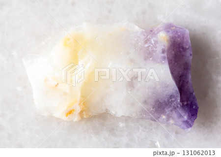 sample of raw opal mineral on white marble 131062013