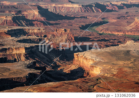 The Green River cuts the landscape. Eroded rugged scenery in Canyonlands National Park, Utah, USA The Green River cuts the landscape. Eroded rugged scenery in Canyonlands National Park, Utah, USA 131062036
