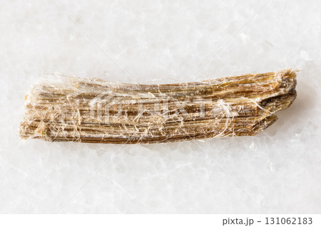 sample of raw chrysotile asbestos mineral on white 131062183